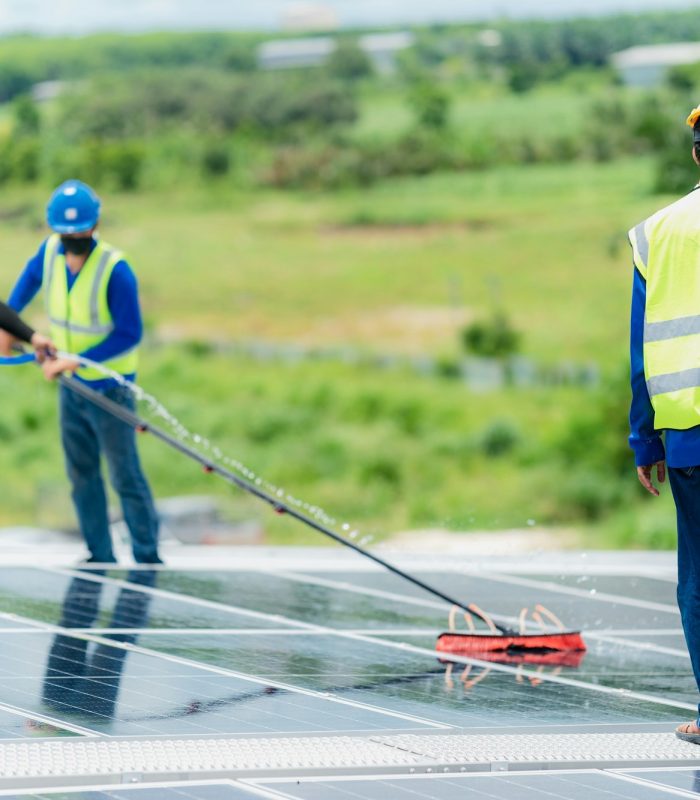 Solar roof cleaning, Professional technicians were washing and the surface of the solar panels